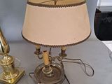 a lamp that is sitting on a table next to a lamp