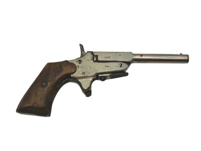 a close up of a gun with a wooden handle on a white background