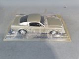 a toy car that is in a clear box