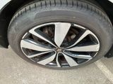 a close up of a tire on a car ' s rim