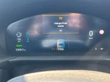 the dashboard of a car with a digital display on it ' s dashboard