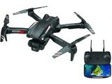 un gros plan d'un drone télécommandé avec un téléphone portable à côté