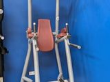 an image of a gym equipment set up against a blue wall