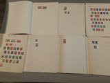 a lot of different stamps on the pages of a book