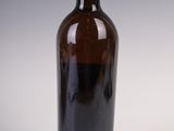 a bottle of wine that is sitting on a table