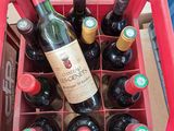 many bottles of wine in a red box