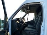 a white van with black leather seats and a steering wheel