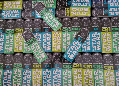 a lot of skateboards that are stacked on top of each other