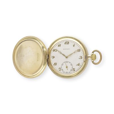 an image of a close up of a pocket watch on a white surface