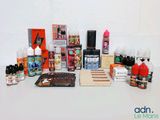 many different types of e - liquids and vaping products on the table
