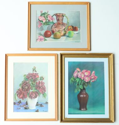 three framed paintings of flowers and fruit on a wall