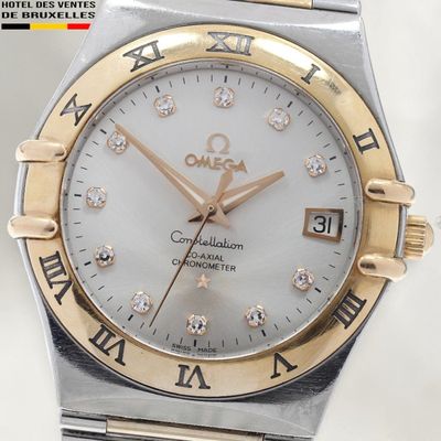 an image of a close up of a wrist watch with roman numerals