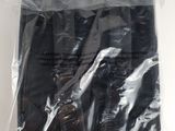 a plastic bag with a pair of scissors in it