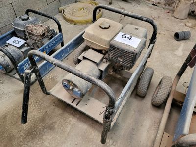 an image of a small engine on a cart
