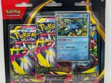 a close up of a package of pokemon cards on a white surface