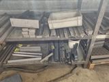 a lot of metal items on a shelf in a room