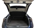 the back of a car with its trunk open showing the cargo area