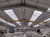 a picture of a factory with a lot of machines in it