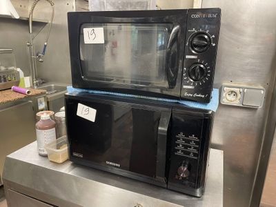 a microwave sitting on top of a counter in a kitchen