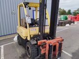 a forklift that is parked in a parking lot