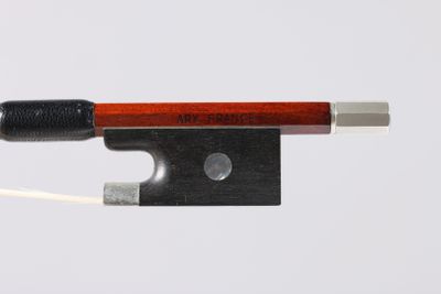 a close up of a violin bow on a white background