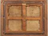 an old wooden window with four panes of glass in it