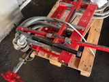 a wooden pallet with a couple of tools on top of it