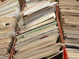 a lot of papers in a box on a table