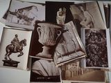 many old photos of a statue and a vase on a table