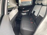 the back seats of a car are empty in the back of the car