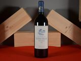 a bottle of wine that is sitting on a table