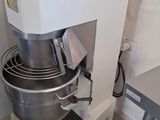 an image of a mixer with a bowl on top of it