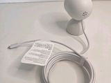 a white object that is connected to a white cord
