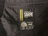 the label on the back of a black jacket with a yellow stripe