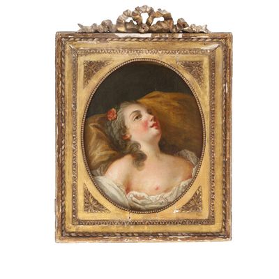 tableau représentant une femme avec une fleur dans les cheveux, dans un cadre doré