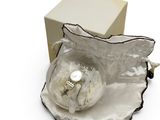 a box with a ring inside of it and a box with a ring inside of it