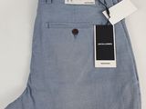 a close up of a pair of blue pants with a tag on it