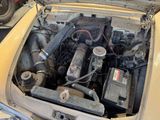 a car engine with a lot of wires in it