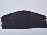 an image of a close up of a black hat with red trim