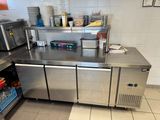 a stainless steel counter in a commercial kitchen