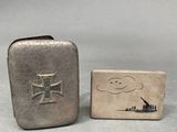 silver cigarette case with a picture of a man and a dog on it