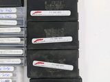 a lot of cassettes that are sitting on a table