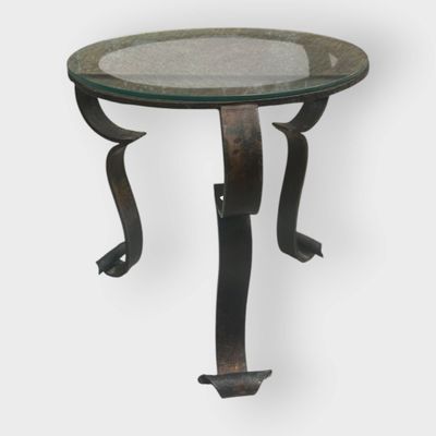 a close up of a table with a glass top on a white background