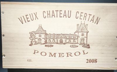 une boîte en bois sur laquelle figure l'image d'un bâtiment