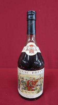 an image of a bottle of wine sitting on a red surface