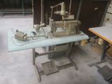 a sewing machine sitting on a table in a room