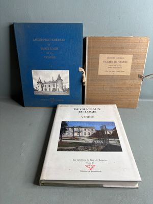 two books sitting on a table next to each other on top of a table
