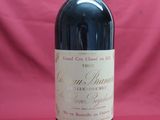 a bottle of wine that is sitting on a table