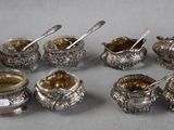 a lot of silver items that are on a table