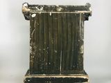 an old wooden planter with peeling paint on the sides